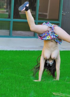 Leila_does_cartwheels_topless_outside
